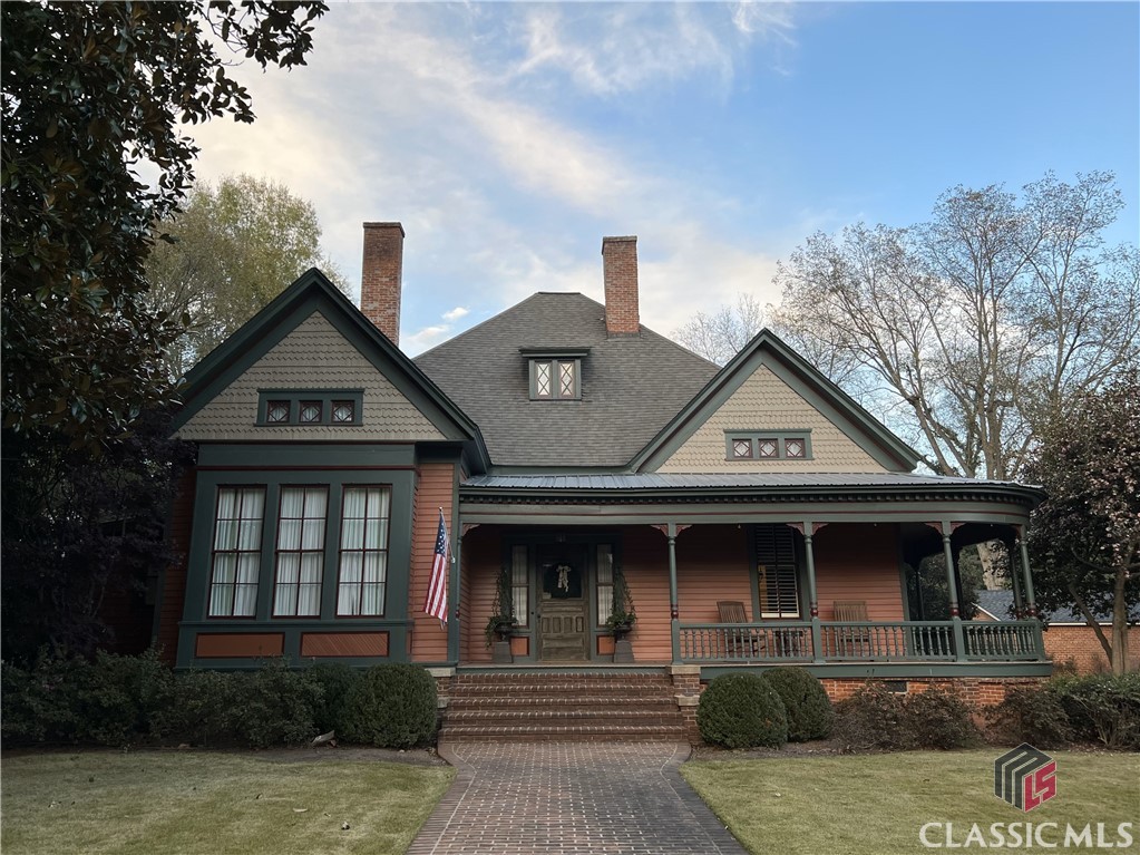 Expertly renovated and maintained historic home in Cobbham; 5 beds, 5.5 baths, 12' ceilings, eat-in kitchen, mudroom, bonus room, original solid wood doors, irrigation system from well, fenced level yard and an outdoor fireplace.
