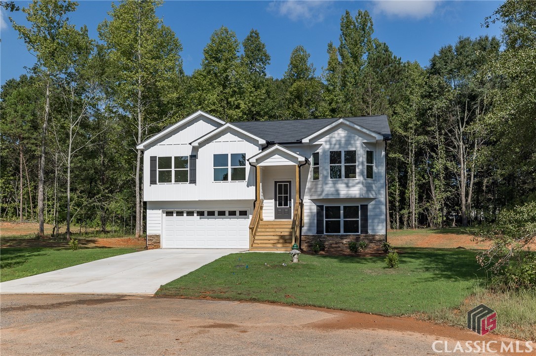 MOVE-IN READY NEW HOME!! LAST home remaining in Woodview! OLIVIA Plan - Lot 6.  Woodview is a quaint neighborhood of only 10 lots all 1 acre each!  5 Distinctive Floor Plans | 100% Financing Available! | $2,000 Buyer Incentive or 1-0 Rate BuyDown* | Standard Features Include: Hardiplank Siding, Popular Shaker Style Cabinetry, Granite Counters, Stainless Appliances, Sodded Front Yards & More! -- The OLIVIA PLAN offers 4 Beds, 3 Baths + Bonus Room!  The kitchen features an island and is open to dining and great rooms all under a vaulted ceiling creating a wonderful open gathering space. The owner's suite and bedrooms 2&3 finish out this level. Bedroom 4, the bonus room and oversized 2 car garage are located downstairs.  Note *$2000 Buyer Incentive applicable when using seller's preferred lender only.  Inquire for details.