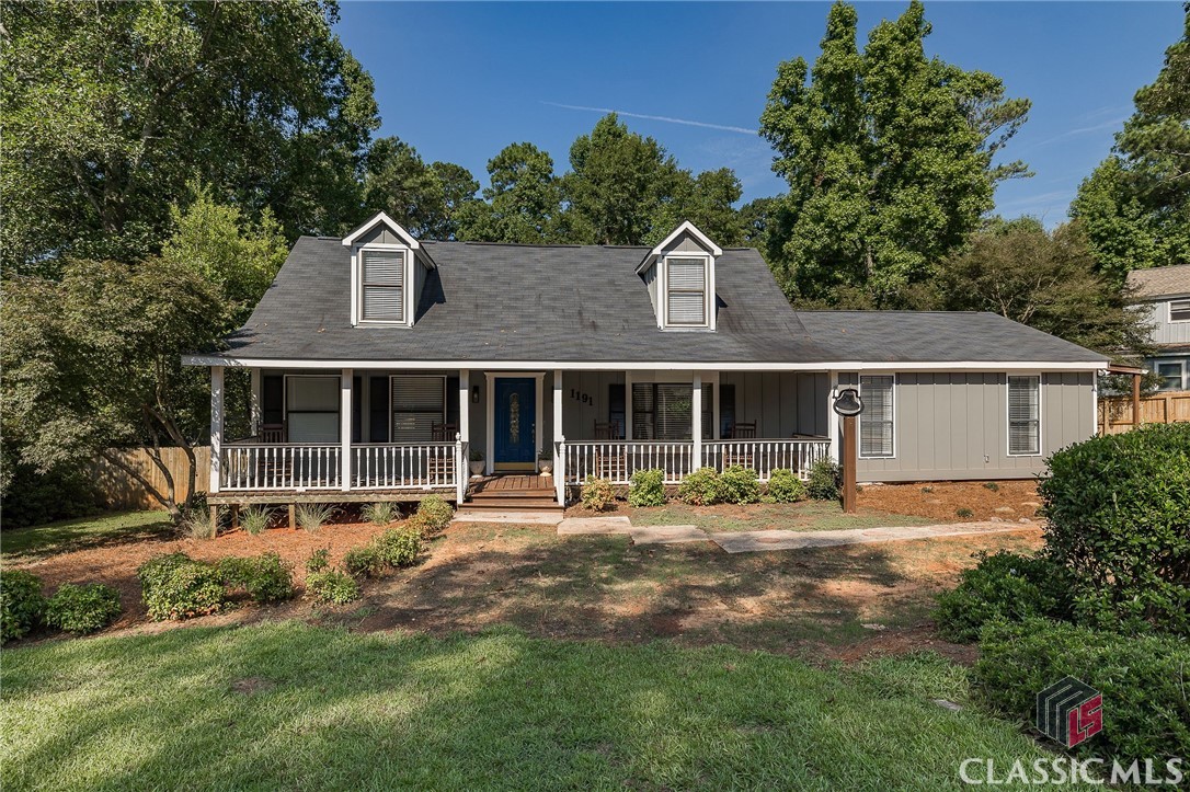 This charming Watkinsville cottage home has an unbeatable location, with grocery stores, dining, shops, parks, and schools all within a mile's radius. Situated between Downtown Watkinsville and Butler's Crossing, you'll have easy access to everything you need in just minutes. The home features 3 bedrooms and 2 bathrooms spread across 2 stories, with a cozy coved front porch perfect for rocking chairs, and surrounded by lush greenery, including beautiful japanese Maples on the property. Inside, an open and inviting living space awaits, with the primary bedroom conveniently located on the main floor. Upstairs, you'll find the other two bedrooms and a full bath. The back door leads to a covered porch with a stunning view of the enclosed backyard and pool, perfect for entertaining guests. The saltwater pool has been recently inspected, salt cell cleaned, and updated with a new pump. With beautiful views from every angle, this home is a true gem.