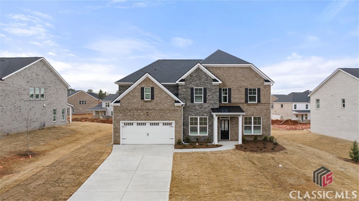 Welcome home to Oconee County's newest neighborhood, Westland!  This neighborhood is close proximity to Hwy 316 at approximate 5.8 miles, and approximately 23 minutes to UGA.   This stately Savannah floor plan offers a plethora of  amazing appointments! Walking in from the front door you Enter your two-story foyer & will enjoy your formal living room, the formal dining has coffered ceilings. Your chef kitchen will have built in double ovens, gas range cooktop, dishwasher and microwave, that will get plenty of use for all your in home dinners. Your guest will be able to enjoy the amazing food offerings in the kitchen cafe dining area, or  sitting at the Quartz countertop island. The ample white cabinets with Quartz brings a clean and modern look to your kitchen space.   Guest will have the luxury of staying over in the guest suite on the main floor. Once you are done for the day, relax in your Supreme Owner's Suite that has a luxury bath, and sitting room with fireplace to keep you warm on those cozy evenings. The Owner's Suite  Large walk-in closet gives ample space for your spring/summer or fall winter collections. Enjoy serenity and fall in love with your new home which is built with a pest system to prevent pest from entering your home, service from outside of your residence. Smart Home System, DEAKO light switches, and 2-10 Home Warranty. The community features a cabana, tennis courts, & pool. Photos used for illustrative purposes and do not depict actual look of home.