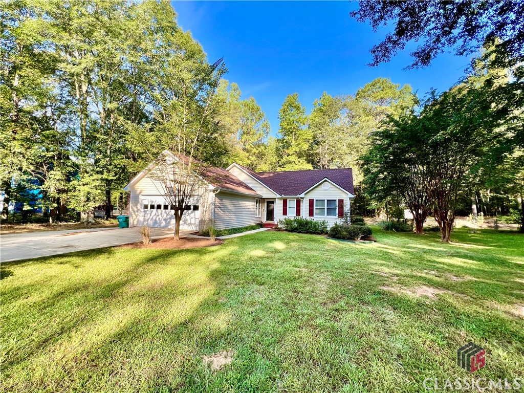 IMMACULATELY MAINTAINED, 3 Br 2 BA Ranch located in a quiet, established neighborhood in Eastside Athens.  Minutes to Shopping, UGA Vet School, UGA bus line, and Loop 10.  This home has been exceptionally well kept with a 2 year old Roof, fresh interior and exterior paint, new lighting, upgraded laminate flooring, refinished decking, and MORE!  You will love this split bedroom plan with its eat-in kitchen breakfast nook plus your choice of: flex space, keeping room, office space, etc  Owner's Suite includes: trey ceilings, double vanities, garden tub, and separate shower. The cozy living room with beautiful fireplace flows seamlessly into the kitchen eating and flex areas, and back out onto the deck for entertaining! Exterior amenities include: Private backyard with wooded buffer and extra, extended side driveway for additional parking.    Don't miss this opportunity!