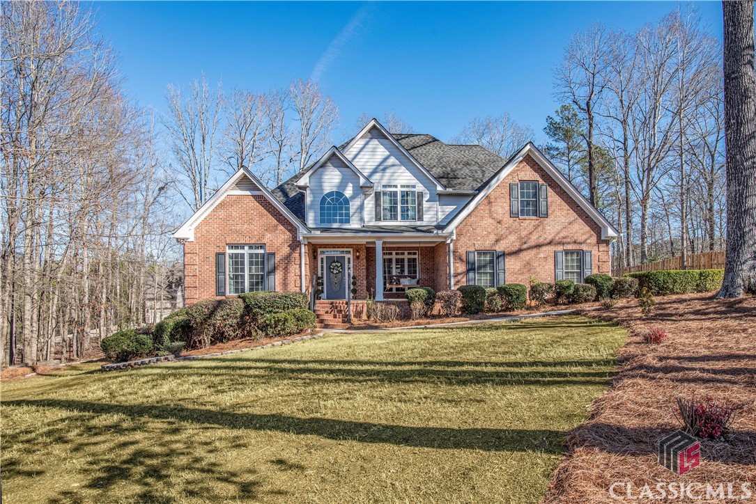 *OPEN HOUSE: Fri 1/26 4pm-6pm; Sat 1/27 12pm-2pm*
Discover the perfect balance of luxury, functionality and versatility in in this stunning 5-bed, 4.5 bath home in Watkinsville, GA!  Nestled in the quiet neighborhood of Pembrook Estates, a warm welcome awaits as you step onto the covered front porch with a charming, oversized swing - perfect for reclining and enjoying peaceful moments. Inside, follow hardwood floors throughout the formal dining room and office space flooded with natural light. Up the stairs you can overlook the impressive family room below, with its fireplace and high ceilings, as you make your way to the 3 upstairs bedrooms and 2 baths. Back on the main level, enter the master suite, which offers a standing shower, jacuzzi tub and separate vanities. You'll find the updated kitchen to be both stylish and functional, offering easy access to the laundry room (which boasts an additional outside entrance), the mudroom and 2- car garage, and a conveniently located half-bath. The cherry on top is the sliding door leading out the expansive back deck with an elegant pergola, perfect for entertaining friends and family on summer evenings. 
The finished basement unveils a haven of entertainment possibilities with a granite wet bar, full bed and bath and multiple other rooms with large walk-in closets. This residence combines elegance, comfort and thoughtful design to create the perfect dream home - don't miss out on the chance to make it yours!