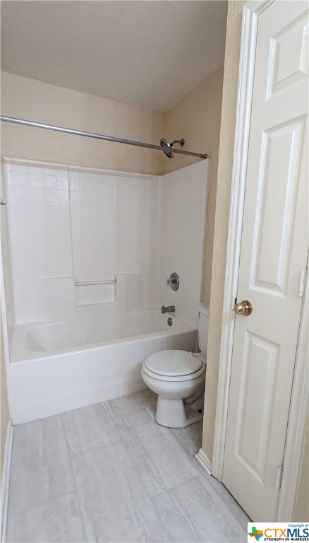 Hallway bathroom shower tub combo with closet