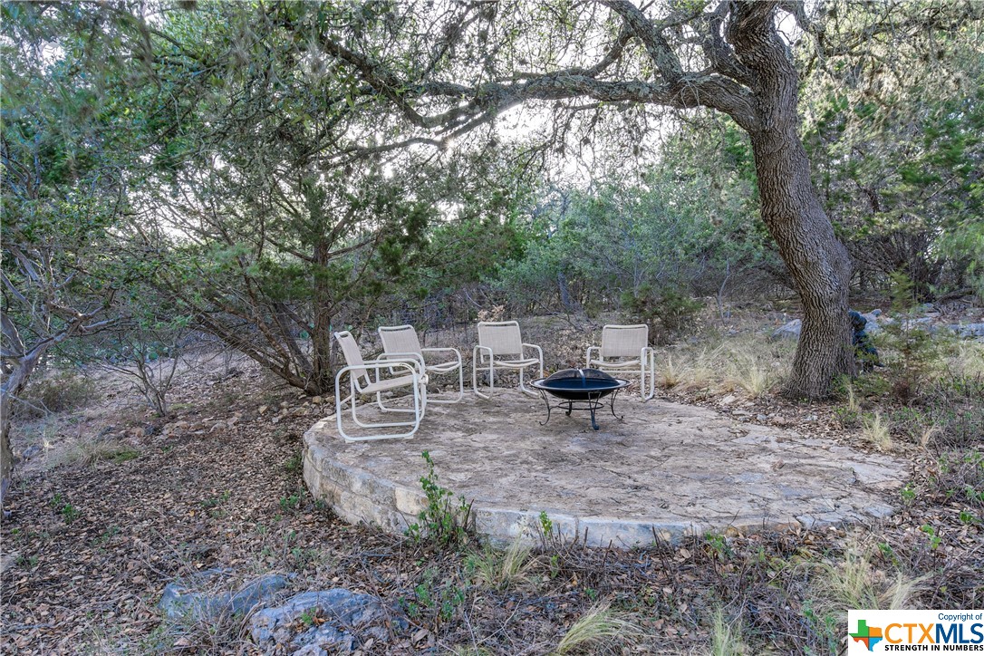 Secondary stone patio for fire pit