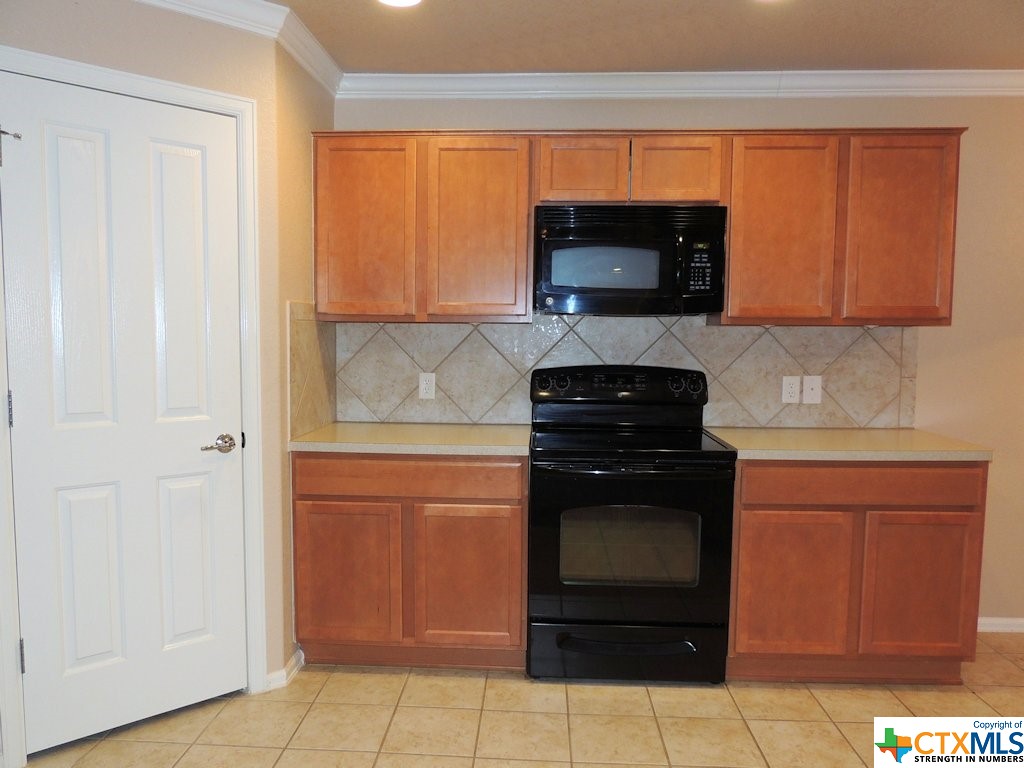 The large walk-in pantry provides plenty of space for food or equipment.