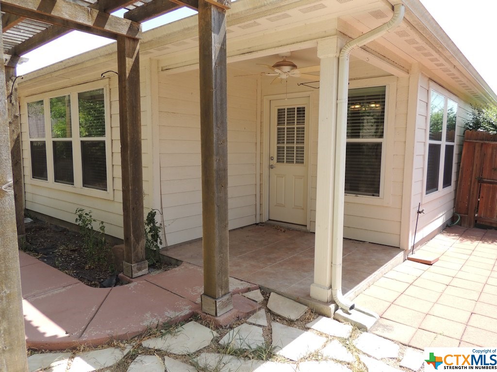 Enjoy the great outdoors in comfort under the shade of the covered patio which also includes a ceiling fan for added comfort.