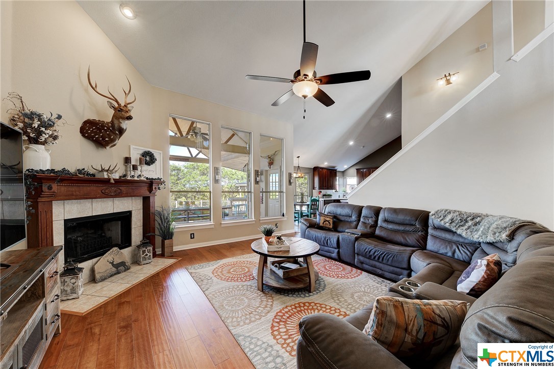 The fireplace with it's custom hearth adds just the right note of ambiance to this scene!