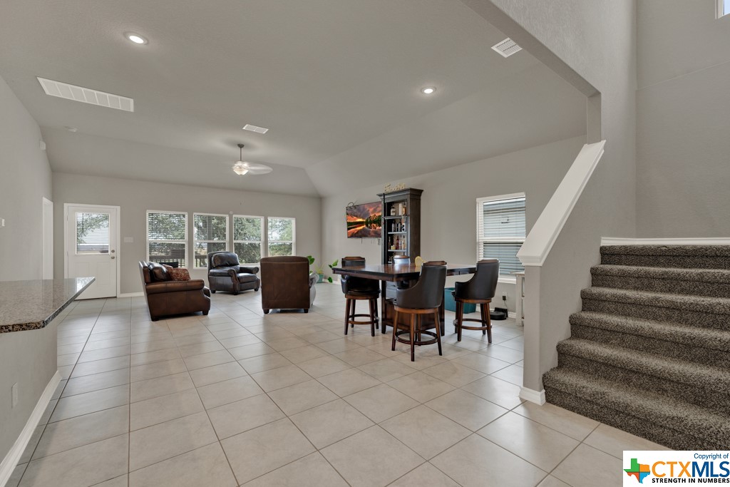 Family room, dining area, and stairs
