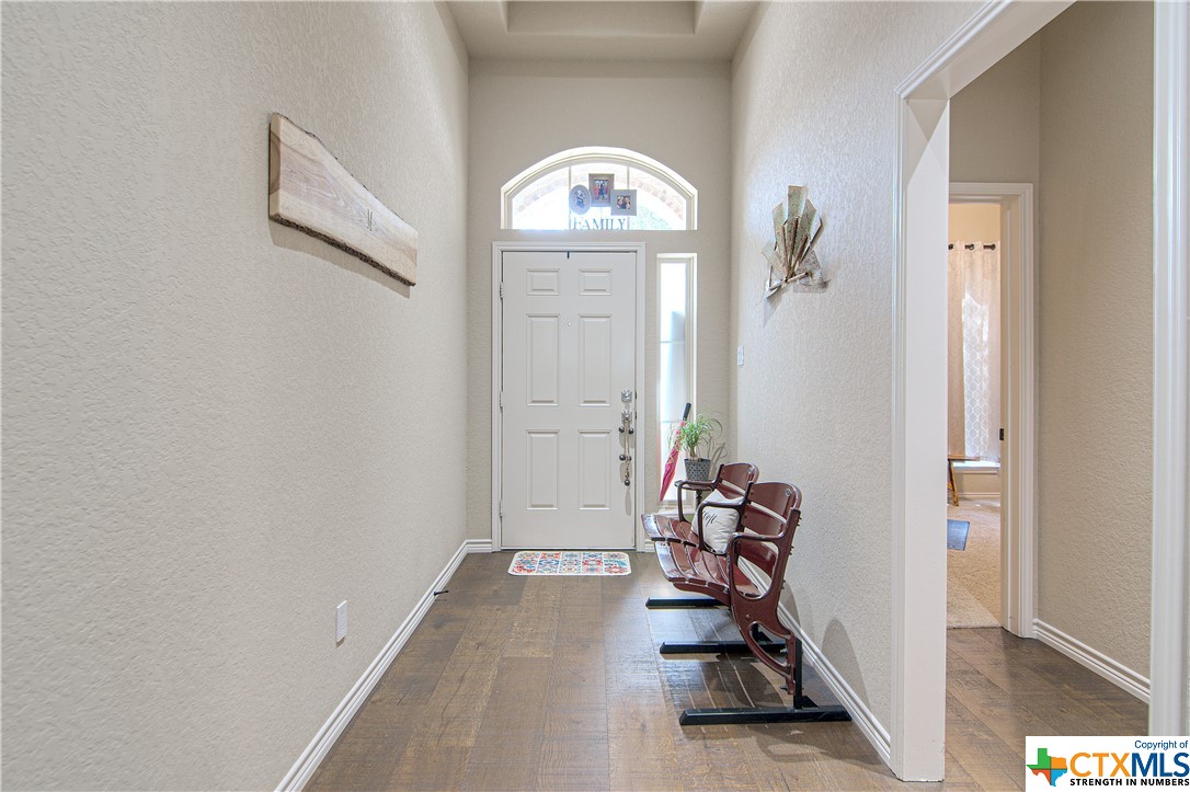 Entry way with 12 ft ceilings