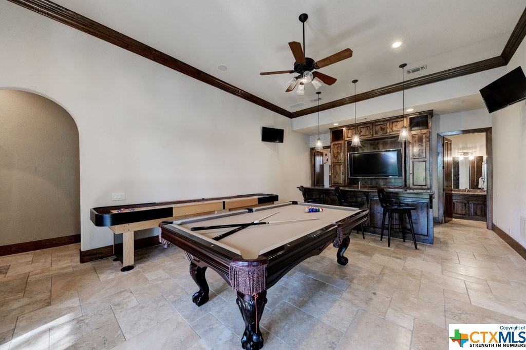 Designed for pure enjoyment, the wet bar provides refreshment with its own wine fridge and ice maker. As well, a media control closet is included in this room. All mounted TV’s will remain in the house for your enjoyment. Shuffleboard and pool table are negotiable.