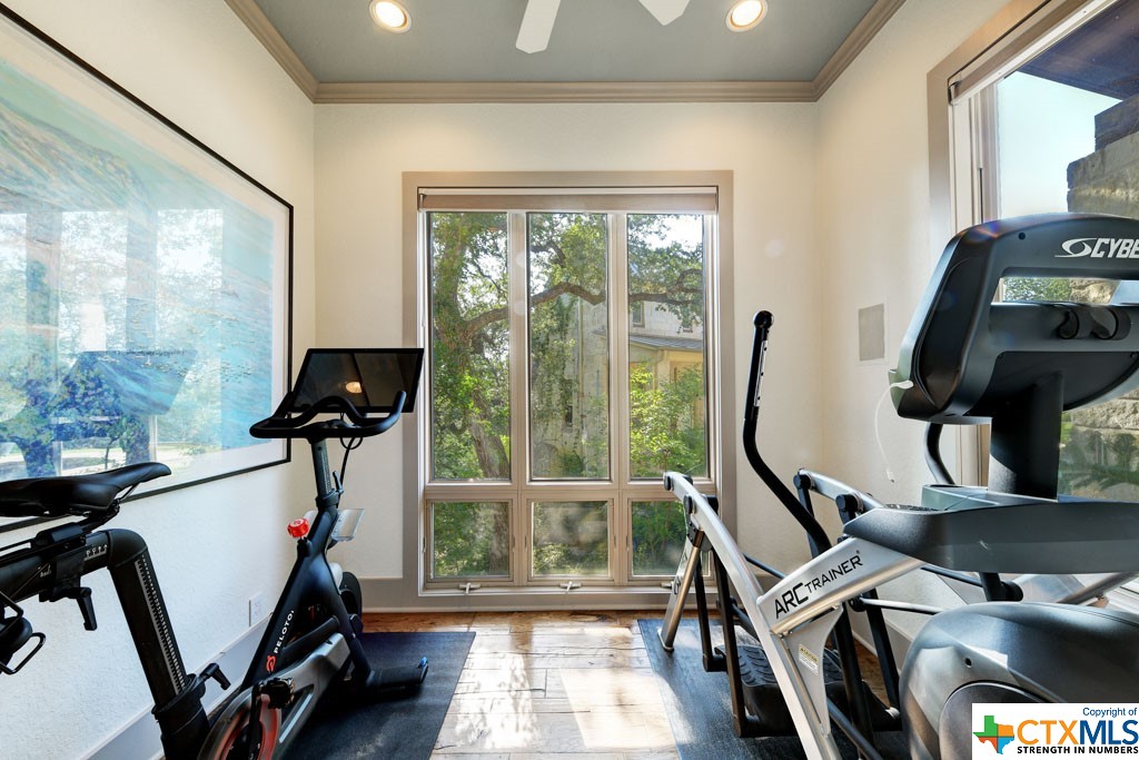 Included in your master suite is an exercise room, complete with a mounted TV that conveys to entice you to stay motivated!