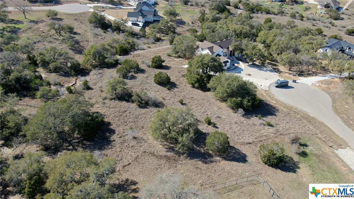 Aerial view from the Prairie Bend side.  This lot is the left side of the culdesac, between the fence shown in the bottom of this photo and the built home at the top.