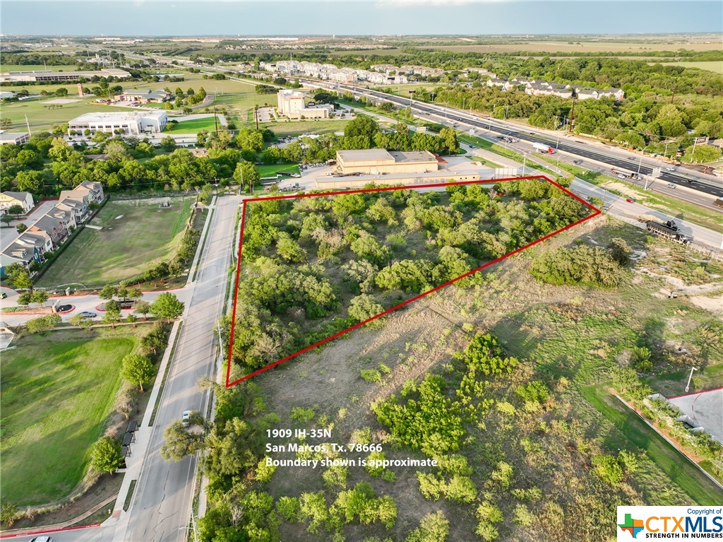 A 3.96 +/- acre tract of commercial land conveniently located off of N. IH-35 access road is immediately ready for your next commercial project. The property’s location immediately off of Interstate 35 makes it an ideal candidate for a wide variety of uses including hotel/motel, loft apartments (w/CUP), Offices, Car Wash, C-Store, Retail and so much more. The property is near Texas State University, Downtown San Marcos, and just minutes from the Premium Outlets and Central Texas Medical Center. Other nearby highlights include the Amazon Fulfillment Center, the San Marcos Airport, and the San Marcos River. Easy access to Interstate 35, Highway 80, and Aquarena Springs Drive and commute times of less than an hour to Austin, San Antonio &amp; New Braunfels. The central location, general commercial zoning, and access to City Water &amp; Sewer make this a unique parcel for a wide range of development scenarios.