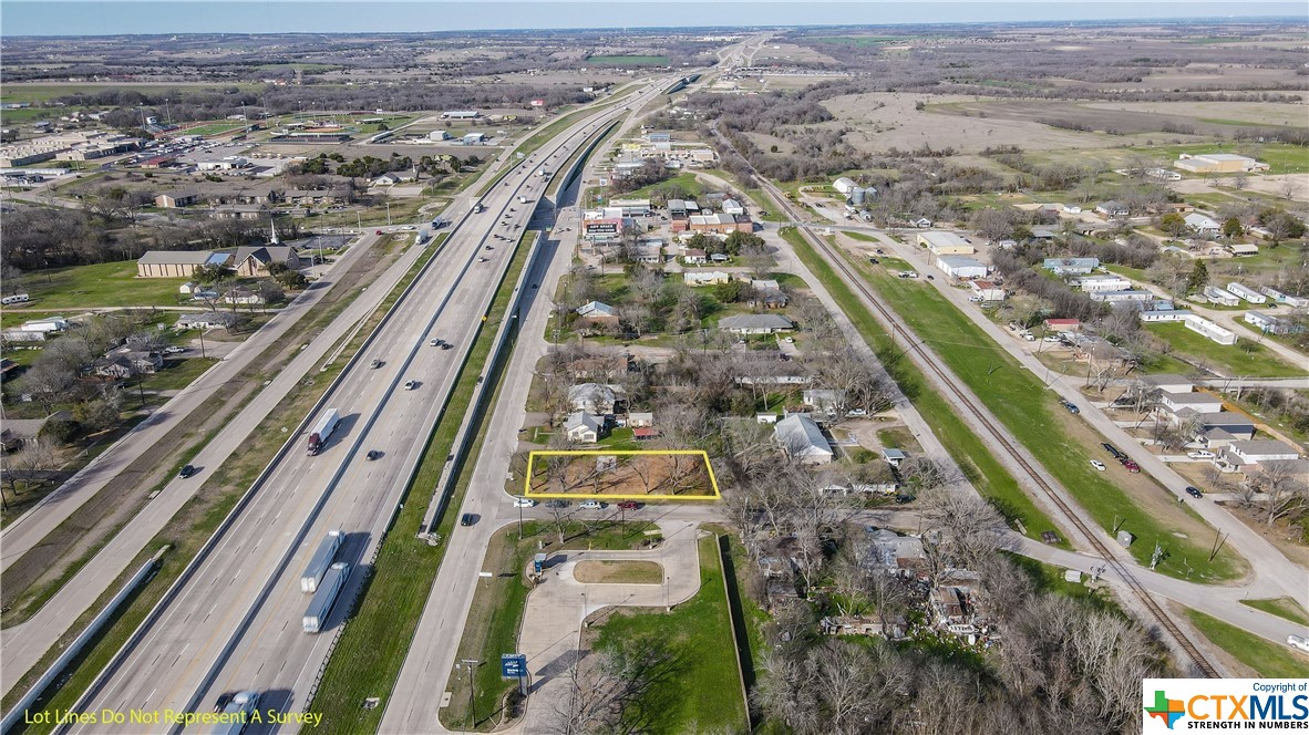 General Business zoned lot on I-35 access rd 3 blocks from Main Street. Would make a great drive through Restaurant. Austin St is a very busy street.