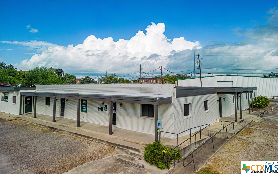 Located in downtown George West, Tx. at the corner of Bowie and Colorado Street, is this approximately 5,800 square foot office building located on 0.362 acres. It is currently occupied by Live Oak Insurance Company, USDA NRCS, and USDA Farm Service Agency offices with approximately 2400 sq. ft. of available space along Colorado Street.