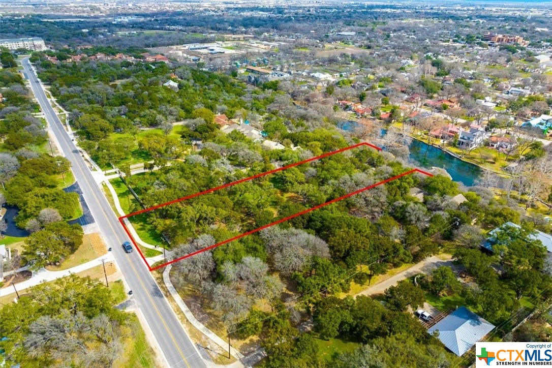 Peaceful hill country living and a huge lot for building the perfect retreat! Notice the proximity to the island and the bridge to access it.