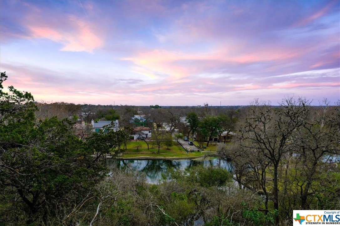 Welcome to 418 Lakeview in the heart of New Braunfels, TX! This is one of only a handful of waterfront lots with this proximity to the private Spring Island on the tranquil Comal River.