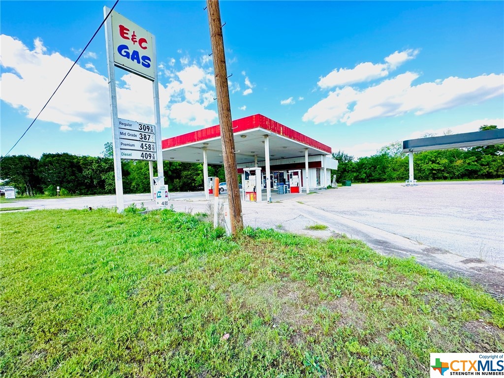 Check out this commercial property featuring a convenient store and once gas station, complete with three inground gas tanks, a beer and cigarette license, large lot, and great location.  With the convenience of a one-stop-shop for fuel, snacks, and other essentials, this property is perfectly positioned to attract a steady stream of customers. Plus, with a license to sell beer and cigarettes, you can tap into even more revenue streams. The property boasts a large lot, providing ample space for parking and easy access for customers. And, with its prime location, you'll benefit from high visibility and plenty of foot traffic.
