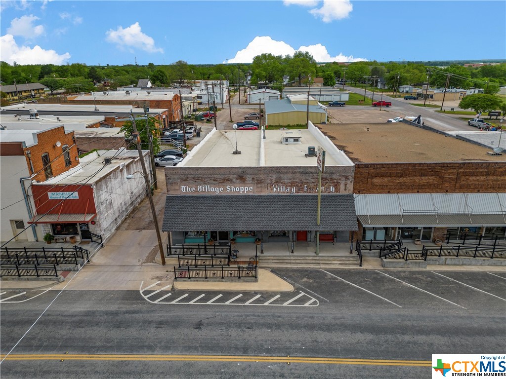 Welcome to this rare opportunity for a commercial building located in the heart of downtown West, TX! With 2500 square feet of space, this property is perfect for a business owner looking to establish their presence in this charming town. West, TX is a tight-knit community that values small businesses. Located on Oak Street (FM 2114) this property is on the busiest street in town, ensuring maximum visibility. The open-concept layout of the store makes it easy to customize the space, & the cash wrap is conveniently located near the center. The spacious storage area in the back of the store provides ample space for inventory or equipment, & the next-door historic Village Bakery building adds to the charm and character of the location. Don't miss this incredible opportunity to establish your business in the heart of downtown. With its prime location, spacious layout, & supportive community, this commercial building is the perfect place to make your mark in this vibrant town.