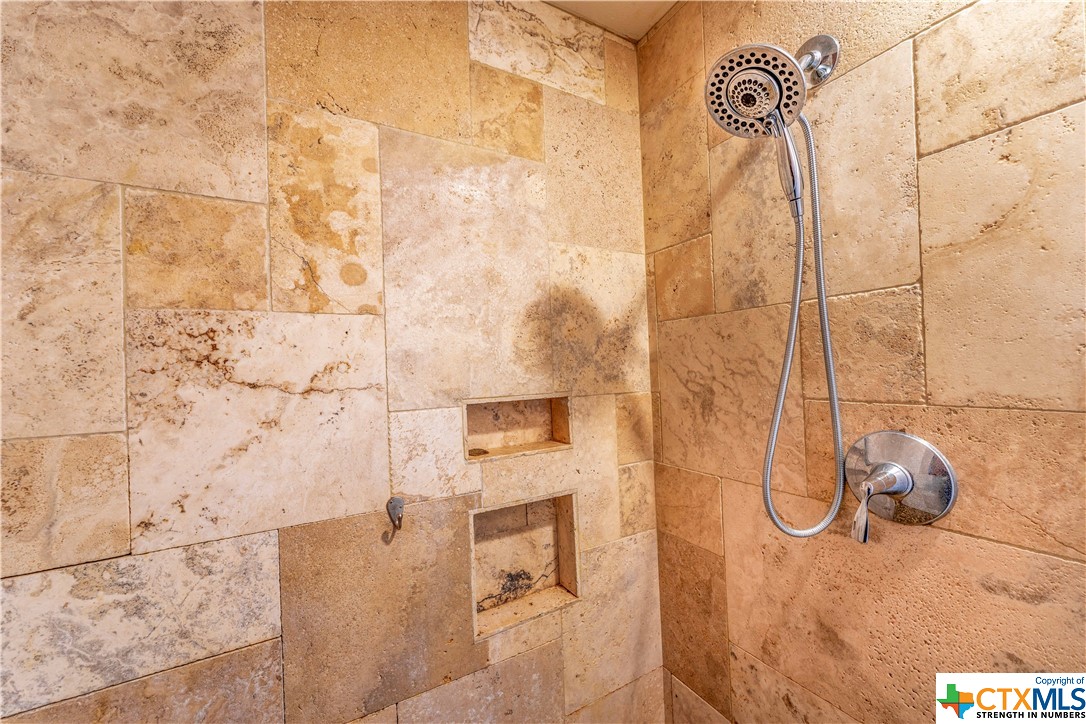 Walk-in shower with tile surround