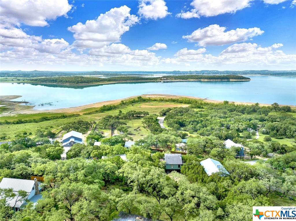 *Lake view alert!*
These 3 lots (to be sold together) offer a beautiful view of Canyon Lake and are just under an
acre total. You can enjoy a cup of coffee on the stone patio or meander down the carefully laid
stone steps to watch the local wildlife in the privacy of these wooded lots, with one partially
cleared for your dream home. Septic has already been installed to service the 3 lots which is a
wonderful bonus! These lots are also partially fenced ,Access to Canyon
Lake and Tamarack Park are within walking distance, pool membership is also available.

3 lots only being sold together!! 
                                    MLS #
1485 Sequoia Trail    - 507368
1501 Pecan Circle        - 507529