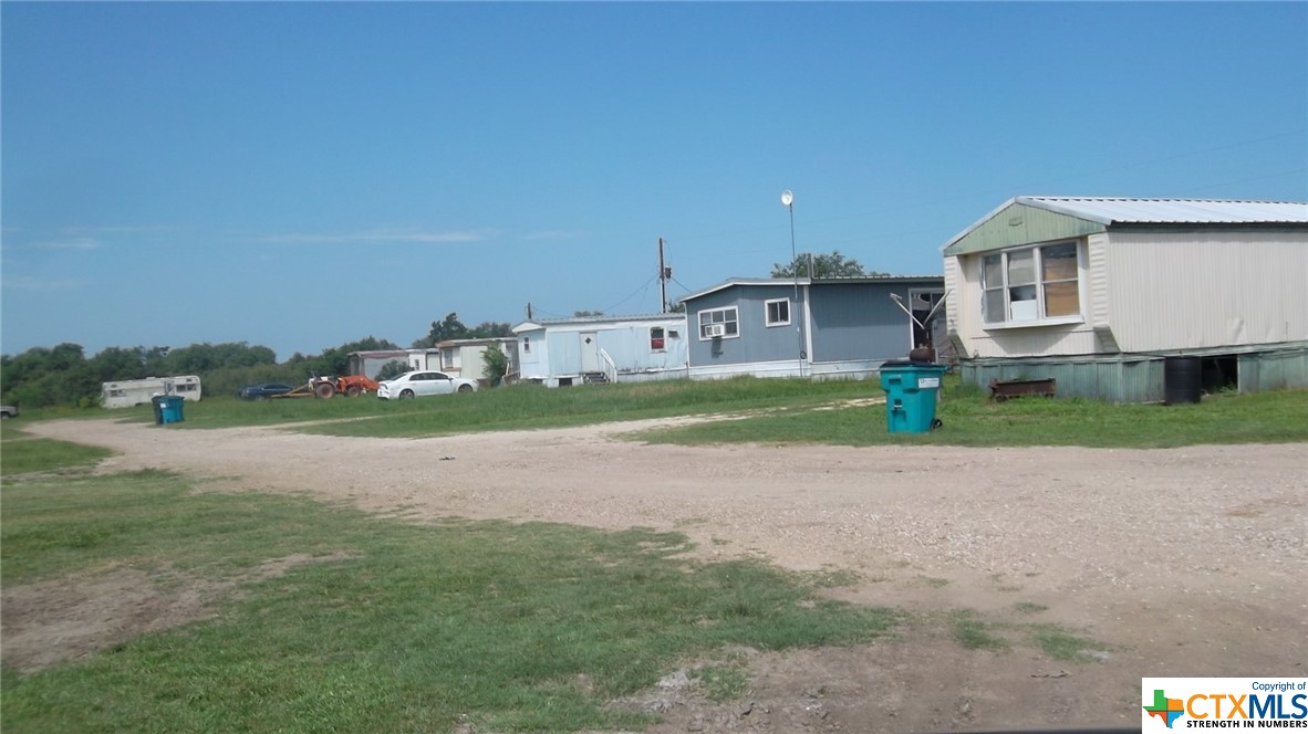 This 25 -acre income producing property in Victoria County has a current cap rate of approximately 18%.  There are 5 homes and 14 rental mobile home spots.  Currently all rentals are full with the potential to add more mobile home rental spots for future expansion.
