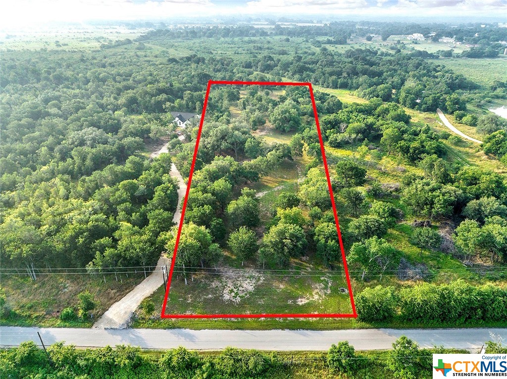 This beautifully cleared lot with mature trees sprinkled throughout will have you dreaming of what your forever home will look like! Bring your ideas and pick a spot to build your private oasis on this 2.88 acres of level land on the outskirts of Luling near Prairie Lea. You're minutes from the 130 toll road to get you to Austin or San Antonio for work or play. Callihan Rd. if off of Hwy 80 and is also a dead end road, so no thru traffic! A water meter has been connected and an electric pole is nearby to add an electric meter. Reach out for additional information to include deed restrictions and building requirements. No manufactured or mobile homes allowed. Septic will be needed.