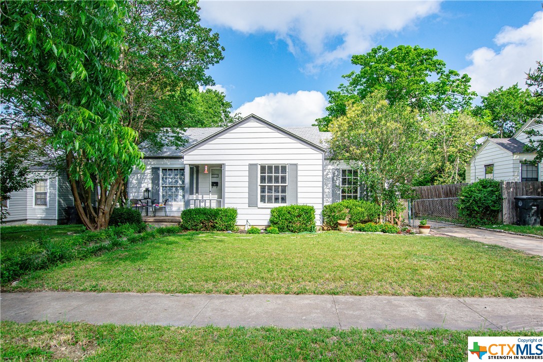 CHARMING 3/1, very close to Scott & White, lots of beautiful windows! One car, detached garage and a gated driveway. Hardwood flooring, large yard, large attic, one block from playground. Great for small family or an investment. OPEN HOUSE SUNDAY, JUNE 4 FROM 2:00-4:00!