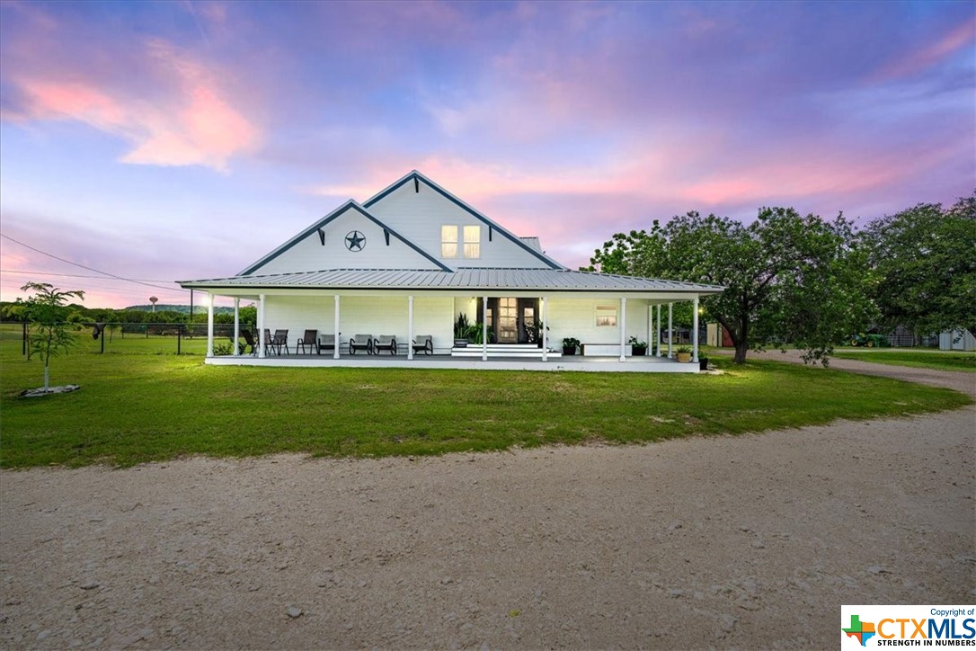 Own your own perfect piece of country living, with this stunning 2 story, 5 bed/3.5 bath, 3,818 sqft home that has been COMPLETELY gutted and BEAUTIFULLY remodeled! This lovely home sits on over 10 acres of land with 3 large workshops, multiple outbuildings, and ample livestock fencing. Enjoy the view on the Texas sized front porch! Upon entering the home, you will notice the delicate upgrades and ample natural lighting throughout. The spacious living room leads to the sleek kitchen boasting a dining area, breakfast bar, gas double oven range, dishwasher, and large walk-in pantry. There are TWO master suites located on the main floor! The first offers a sitting room with a kitchenette, back patio/sunroom access, a walk in closet, and private bathroom with a walk-in shower & garden style tub. The second offers a SECRET bonus room, walk in closet, and a private bathroom with huge walk-in shower & garden style tub. This home has SO much to offer, don't hesitate & schedule a viewing today!