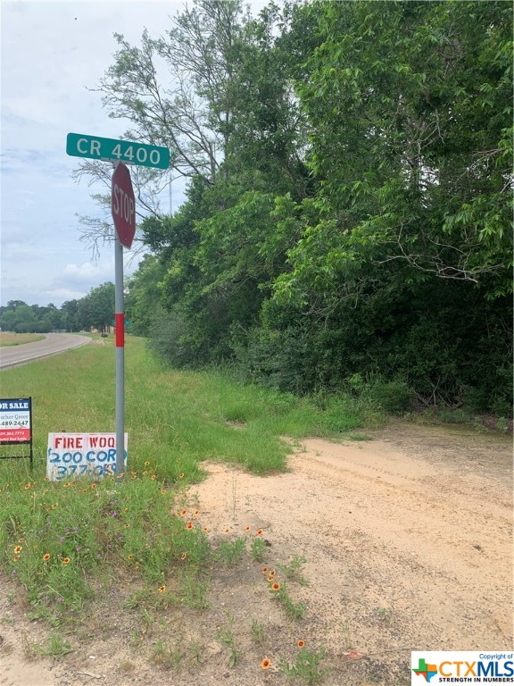 This 18.86 acres of raw land has road frontage on FM 92 and CR 4400.  This untouched land has a mixture of hard wood and pines that can be harvested to offset the cost of the property.  This land is ideal for building a new home, a weekend getaway or a cabin for hunting or nature watching due to the year around wildlife.  The property contains two spring fed creeks including a water fall for year around water to the property.  The property is located a quarter of a mile from the Neches River but due to its elevation it is secure from flooding.  This property is only 10.4 miles from Martin Dies Jr. State Park on B.A. Steinhagen Lake and 37 miles from Sam Rayburn Marina on Lake Sam Rayburn.  The property has access to Spurger water company and Sam Houston Electric company. This can be your piece of Southeast Texas in the Piney Woods.