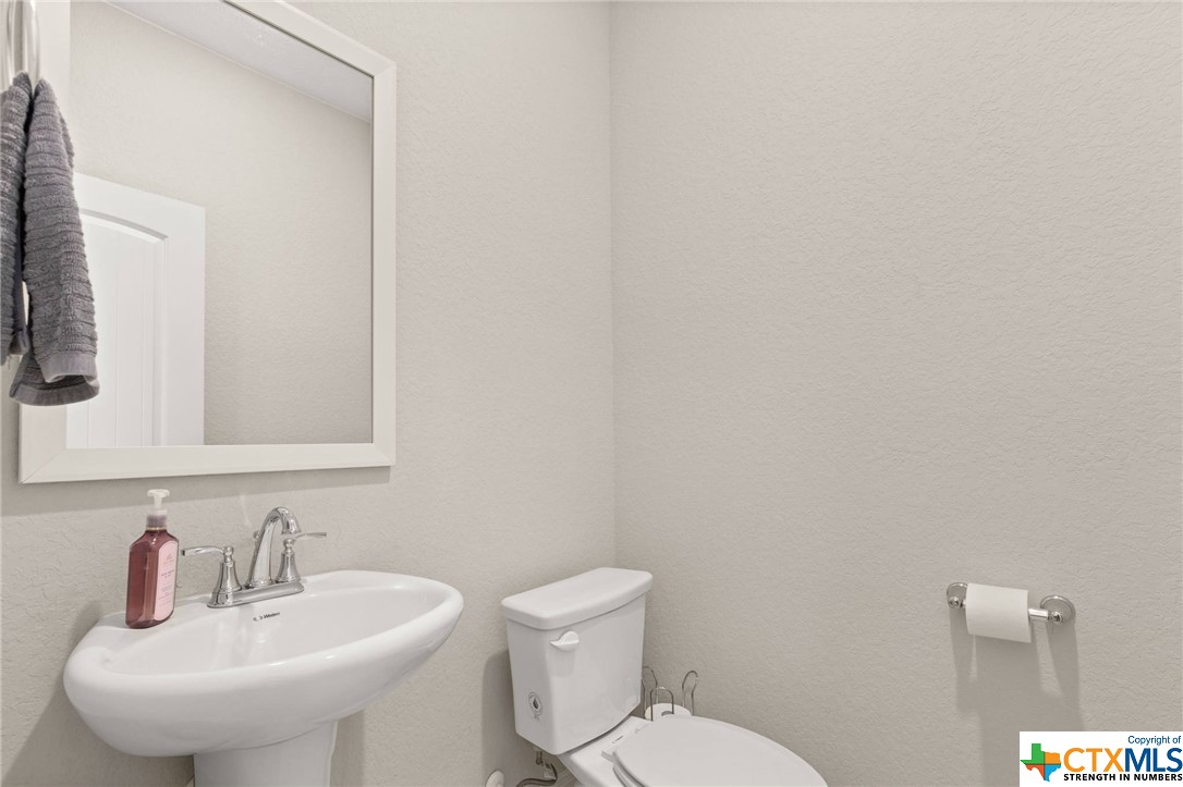 This rare 1/2 bath upgrade is in the flex/office/4th bedroom space - providing added convenience and value.