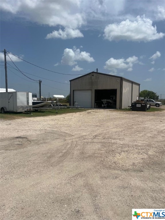 HIGHWAY FRONTAGE! Endless possibilities. The property consists of a 5,480 square feet metal building and a 1,904 square feet mobile home on 5.46 acres on Highway 87.