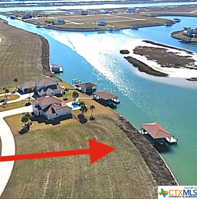 A BIT OVER 1/2 ACRE LOT WITH 2 BOAT SLINGS w/ 100' of Bulkhead IN CENTER ISLAND! Close to the boat ramp and amenities! LARGE BOAT RAMP! POOL! Lot located inside the shoot! Perfect for your vacation home!  MAKE FAMILY MEMORIEE!  MAKE IT POC!