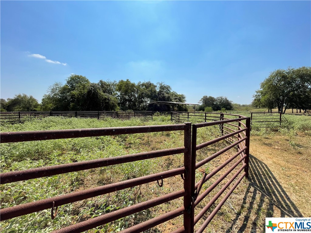 OWNER FINANCING AVAILABLE WITH ONLY 5K DOWN!
Located in the New Johnson Farms Development with tracts ranging from 4 - 9 acres.
Small acreage tract with pipe round pens, 2 enclosed horse stalls and 40 x 50 ft. concrete slab already in place.
Improved coastal field with several mature trees along the short wet weather creek area. 
All new perimeter fencing and entrance was just installed!