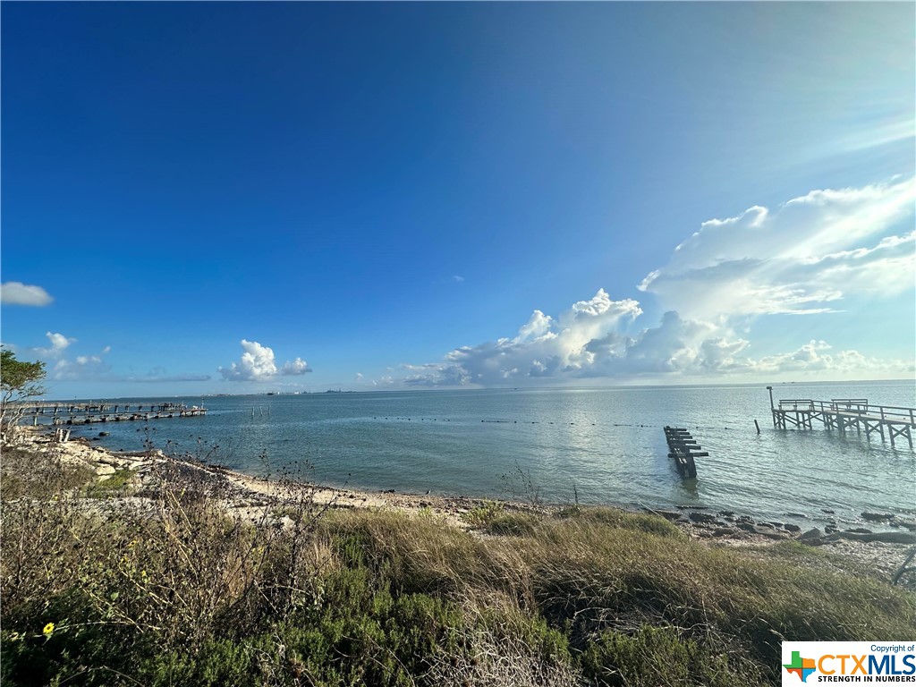 Welcome to this stunning bayfront lot located on Alamo beach! This unrestricted property spans over 1.033 acres, offering plenty of space and unlimited possibilities. With access to water and sewer, this makes it a prime location.

Imagine waking up to breathtaking views of the bay every morning or enjoying a day of fishing and boating right from your own backyard. This lot provides the perfect opportunity to build your dream home or vacation getaway, designed exactly to your preferences.

Whether you're looking to escape the city life or create a serene retreat, this unrestricted piece of land offers the flexibility to bring your vision to life. Don't miss out on this incredible opportunity to own a slice of paradise on Alamo beach.