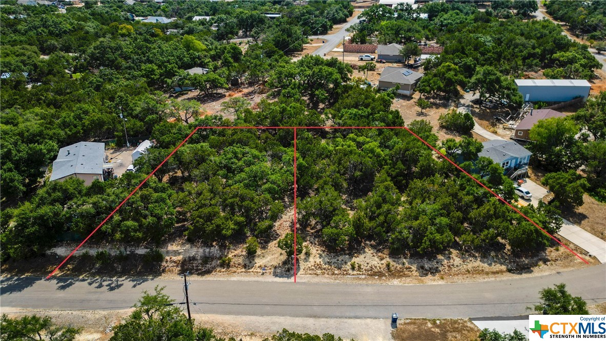 Affordable double lot in Canyon Lake!  Great hill country location, conveniently situated between San Antonio, New Braunfels, and Austin and all they have to offer. These gorgeous lots offer great views, wild life, a blank canvas for you to build the home of your dreams. Deer Meadows HOA gives you access to community pool, clubhouse and playground. Two separate lots being sold together with the option to build on each. Easy to show! Schedule your visit today!