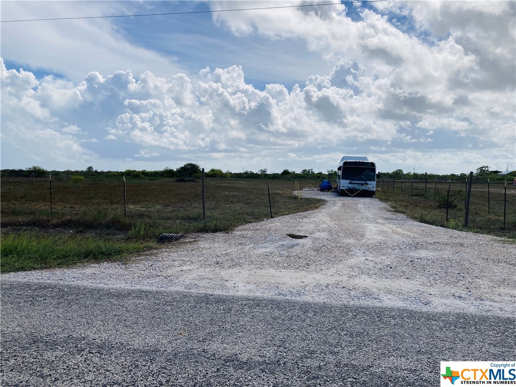6 lots with a little over an acre.  A bus with 320 SF that serves as a mobile residence.  Good weekend getaway to sit out and relax or go fishing. Bus needs a few finishing touches. There are 2 window units, water heater, and generator.