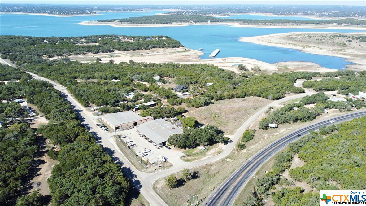Robust marine repair shop sits on a corner lot with high visibility to the traffic on FM 306 and is strategically located under 1 mile away from the JBSA Recreation Park at Canyon Lake. Property has 6 parcels, paved lot with inventory, storage shed, two metal workshop buildings with one of them housing retail store front and upstairs apartment that overlooks the retail area.