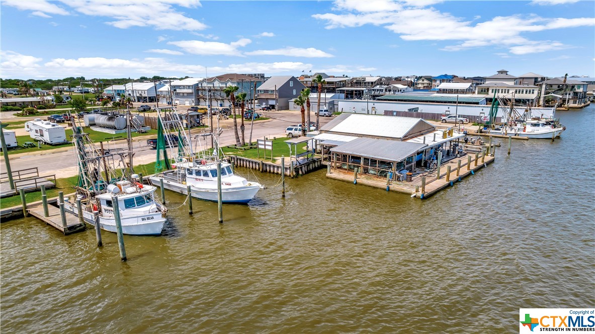 Don't miss out on this great development opportunity on the Texas Gulf Coast! This 3.7 acres is prime location with approximately 600' of Intercoastal Water Way frontage in Port O'Connor, TX. Currently known as The Fishing Center, it provides access to on water fuel, ice, bait and last minute items. Property features boat ramps, trailer parking, RV camp sites and boat slip rentals. Previously platted for an 19 lot subdivision, this property has endless possibilities. Port O'Connor is located within a few hours of most major cities and is known for it's quaint small town vibes.