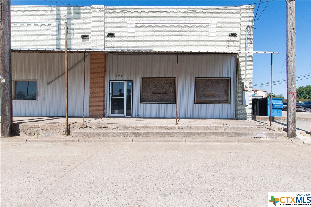 Commercial buildings that can be sold individually or as a group of 6 or less. These buildings are priced to be "as is". 3,812 sq ft with front and back access. This building is closest to the Post Office.
