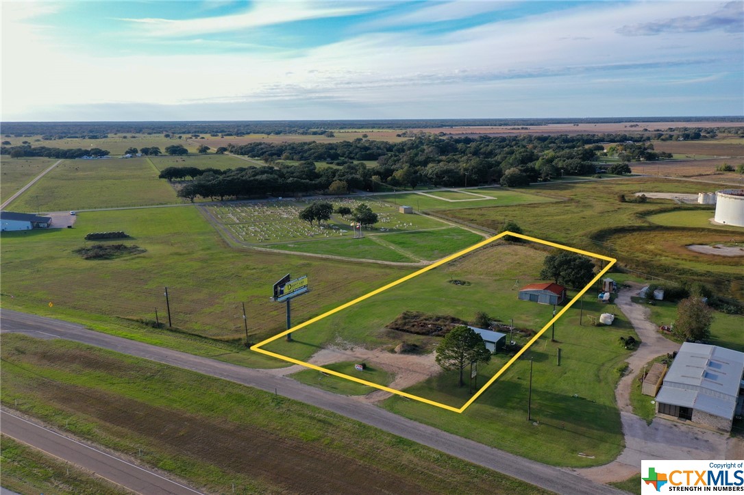 This prime 2-acre commercial real estate parcel is strategically positioned along the frontage road on highway 59 South, making it an ideal canvas for a wide range of business ventures. With the high traffic count, the possibilities never-ending. Whether you want a retail establishment, camper park, storage yard, or any other commercial endeavors, this location offers the exposure and accessibility needed for any business. This parcel also comes with a billboard contract in place making this an instant income producing property. Don't miss out on this opportunity to secure a prime piece of real estate WITHOUT restrictions or zoning.