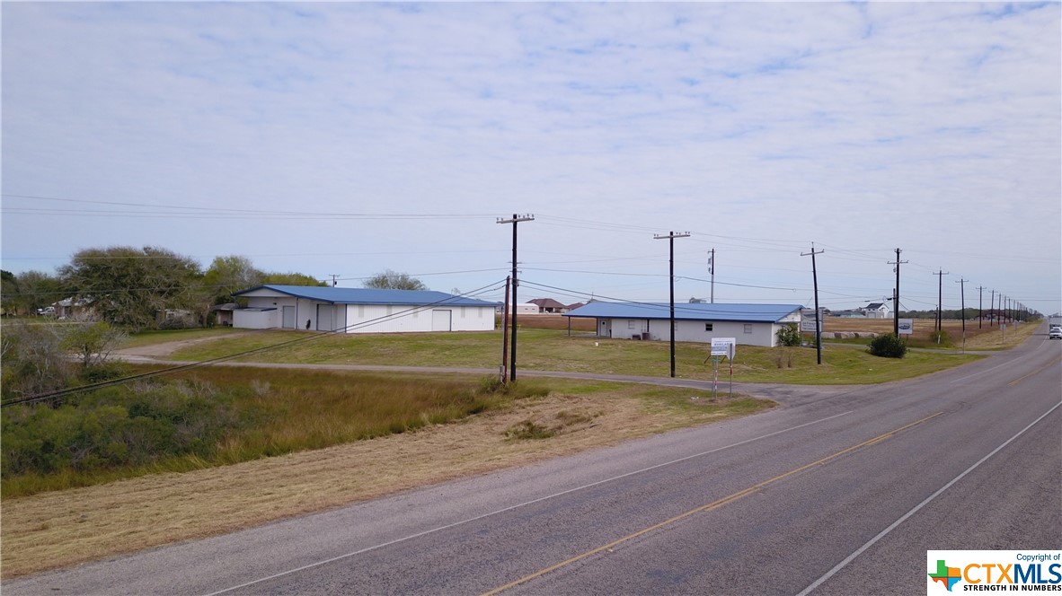 Commerical office and shop located on busy highway located outside of city limits. Office building is 2598 sqft and has 5 offices, kitchen and 2 bathrooms. Shop is 4500 sqft with 2 offices and a bath and storage room. Shop has 5 roll up doors and 2 large lifts.