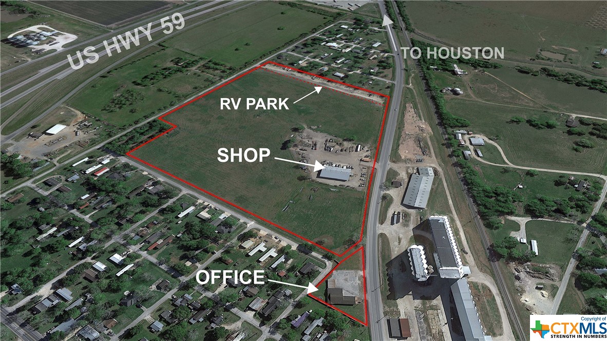 Prime Commercial Location!! The Ganado Commercial Property is located on Business 59/York Street within the Ganado city limits with convenient access to US Highway 59 and the future I-69 corridor. The property is comprised of two tracts with a total of 30.84+/- acres. A .64 acre tract has 335+/- ft. of Business 59/York Street frontage and contains a 3,690+/- sq. ft. office building, originally built in 1998 and remodeled in 2013. The stone veneer office building has 12 generously sized office spaces, a conference room, kitchen, carport and separate men/women bathrooms at two ends of the building. The 30.20+/- acre tract has approx. 1,200 ft of frontage on Business 59/York Street and 900+/- ft. of frontage on Mauritz Avenue. The entire tract is high-fenced with an electric entrance and has a 4,960+/- sq. ft. shop with attached 4,960+/- sq. ft. lean to. Both the shop and lean to have concrete floors. The northern fenceline of the 30.20+/- tract has an approx. 3.6 acre fenced area that serves as an RV Park. The park has 26 spaces with hookups and a separate entrance off Mauritz Avenue. Some portion of the 30.20+/- acre tract is in the 500-yr floodplain and only a small area on the north fenceline is in the 100-yr floodplain.