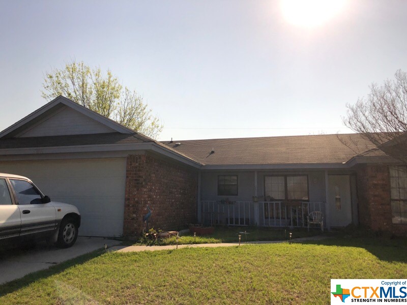 3 bedroom, 2 baths, Washer and dryer connections, electric range, refrigerator, fence, fireplace and 2 car garage.