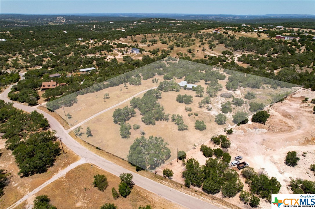 Beautiful, tucked away 10 acres property with large Live OAK trees, fenced in and mostly cleared. Besides the existing 3 bed / 2 bath home, there is plenty of space for building more structures. The property is located outside the city limits, tucked away from the main roads. No restrictions !!