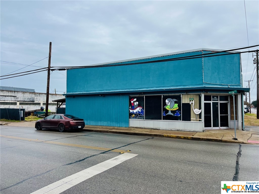 Commercial building on the corner of Main Street and S Virginia Street with lots of potential.