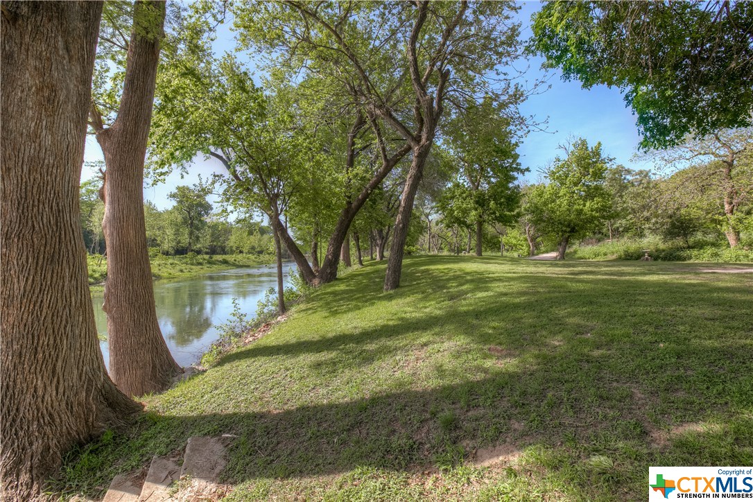 Beautiful waterfront property with 2 sets of access steps to the river.