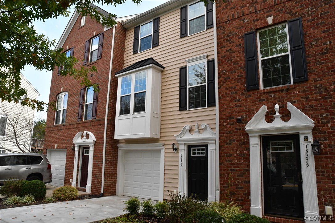 4 Bedroom, 3 Bath Townhome with a Garage!