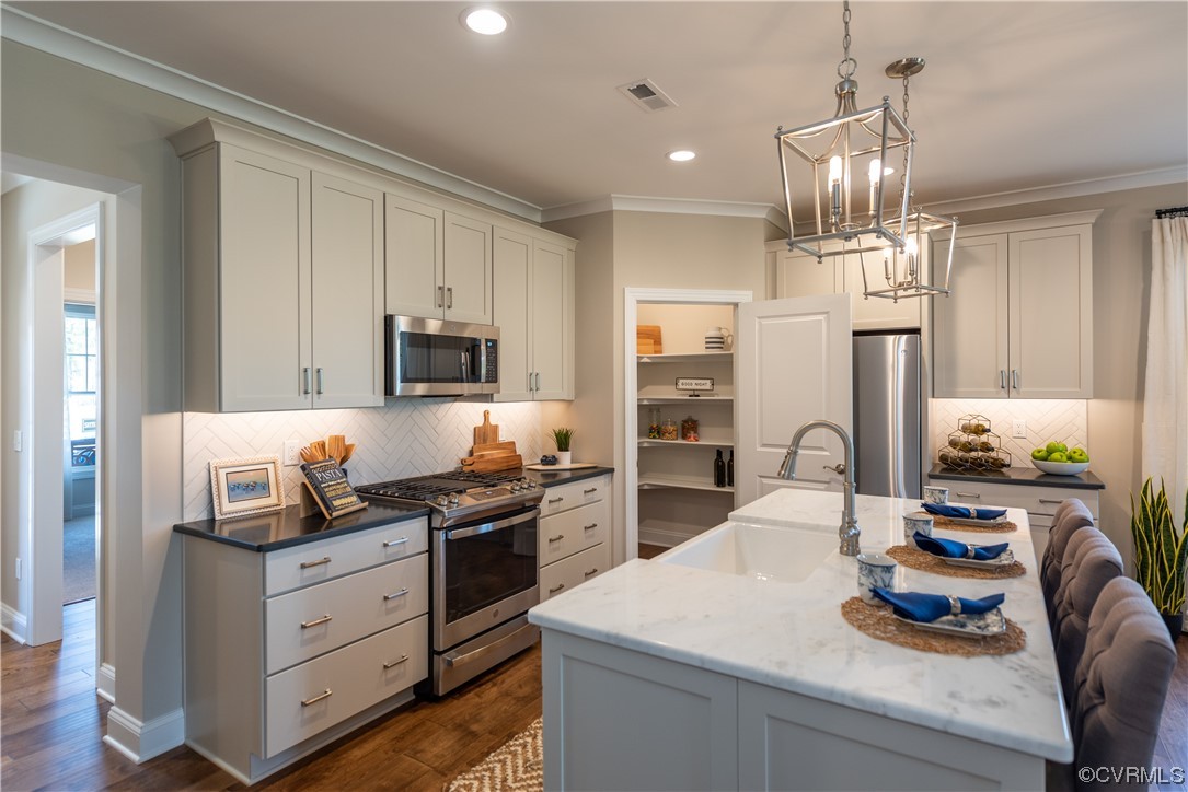 Photos are of the Azalea Model Home and may demonstrate optional features and finishes.
