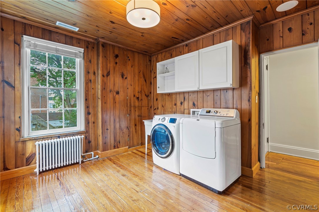 Huge laundry room with sink and storage room